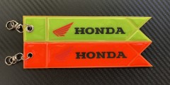 Брелок светоотражающий Хонда двухцветный 3*23 см.