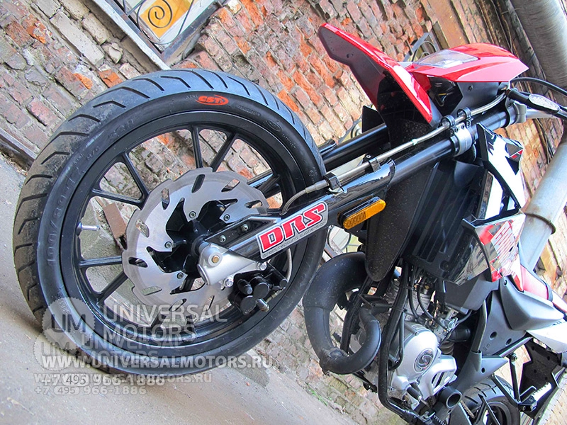 Мотоцикл STELS Trigger 50 SM Competition, Задняя подвеска описание рычажная, маятникого типа, с одним пружинно-гидравлическим амортизатором