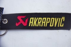 Брелок "Akrapovic" ткань, вышивка, чёрный 13*3 см.