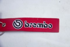 Брелок "Брембо" ткань, вышивка, красный 13*3 см.